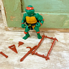 Figura de acción vintage 1988 TMNT Miguel Ángel con accesorios | Playmates
