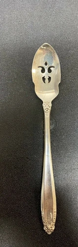 1 INTERNATIONAL PRELUDE STERLING  OLIVE SPOON   WITH HOLES         3 AVAILABLE
