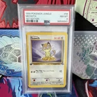 Pokemon TCG WOTC 1999 Jungle Meowth 56/64 1st Edition PSA 8 Regular EN