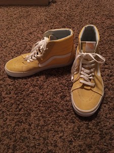 yellow and white high top vans
