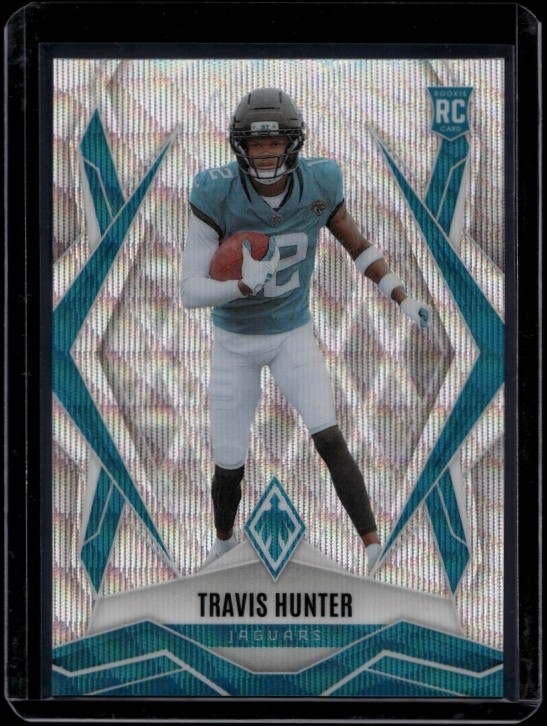 2025 Panini Phoenix Football Travis Hunter #157 RC Rookie Silver Wave /199