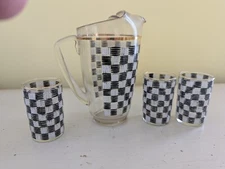 Set Of 3 Glass Tumblers And Pitcher With Gold Trim And Checkerboard Design
