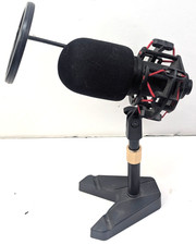 USB condenser microphone set with a pop filter and tripod stand.