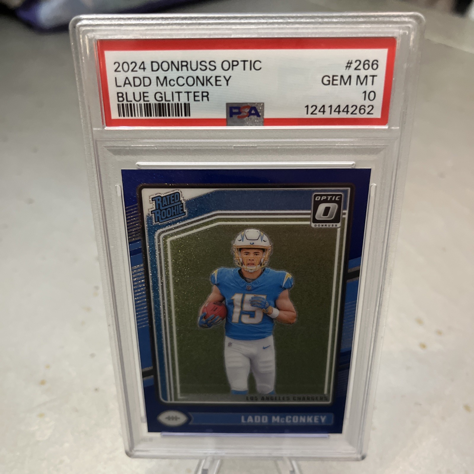 2024 Optic Blue Glitter Ladd McConkey #266 Rookie RC PSA 10