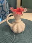 Fenton art glass pitcher in peach crest pattern , featuring a beaded melon shape