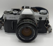 Canon AE-1 35mm SLR Film Camera with Canon 50mm f/1.8 FD Lens READ
