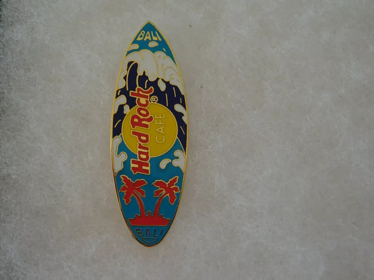 Red white shop and blue surfboard
