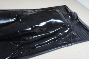 Rubber vacuum bed bondage