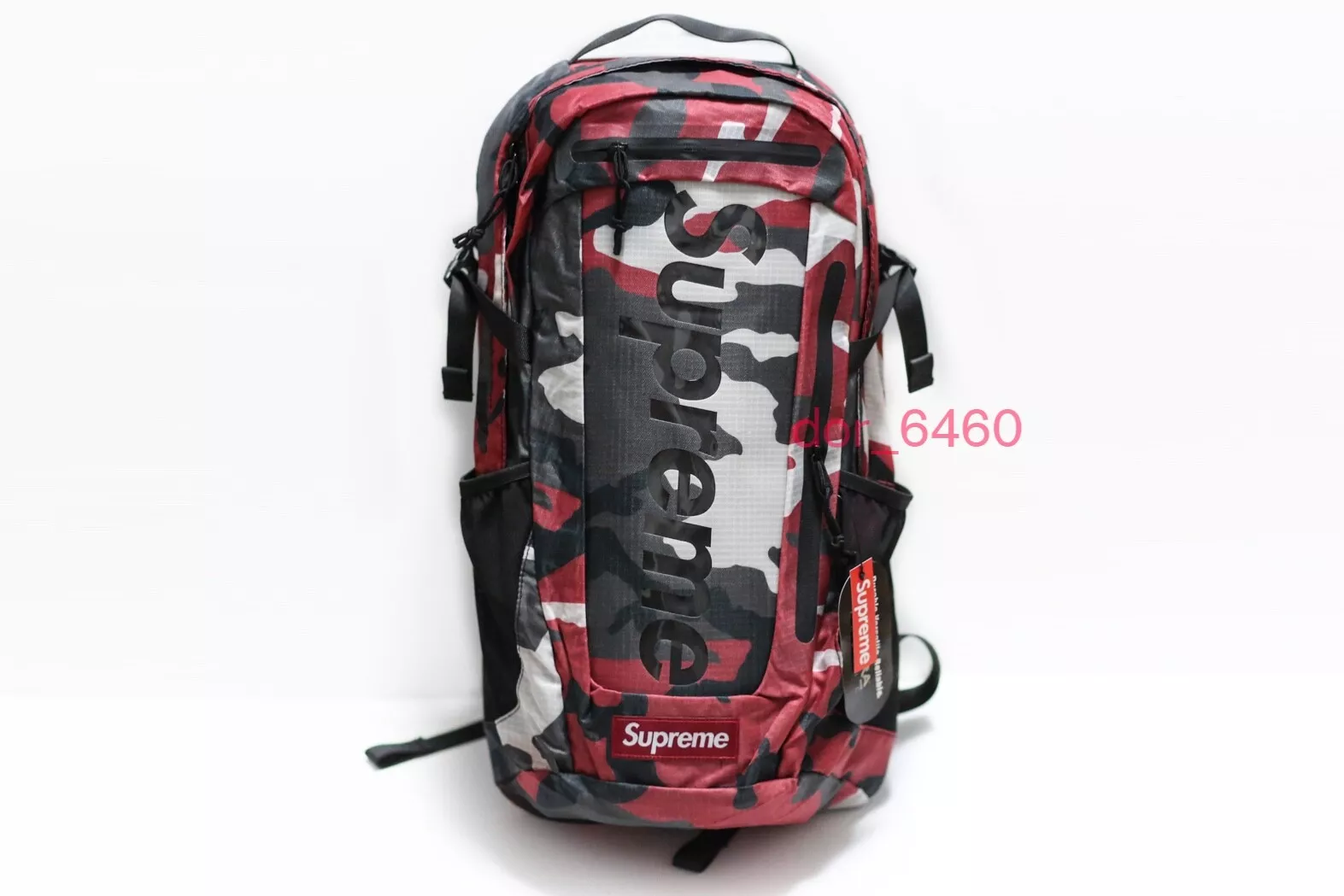 Sac à dos camouflage rouge Supreme SS21 avec étiquettes