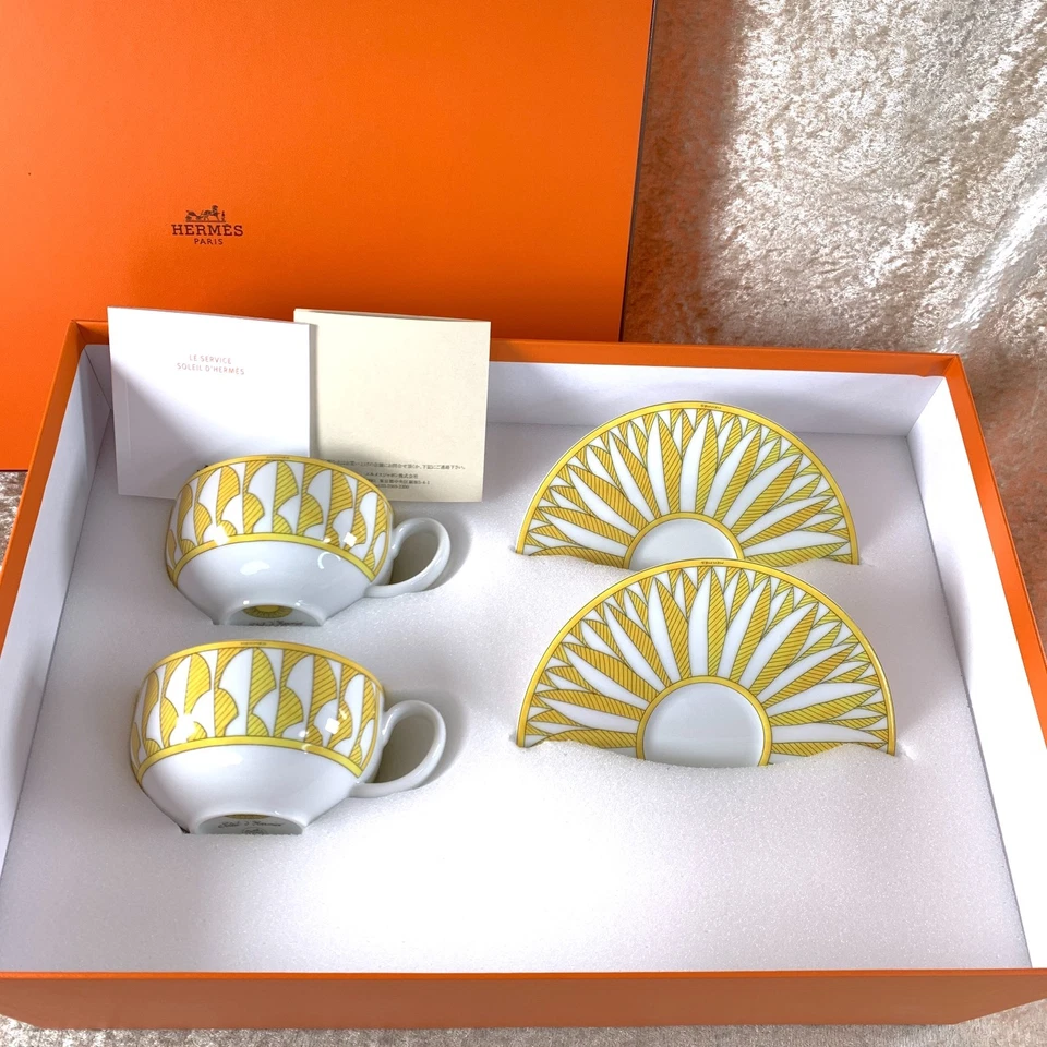 Taza de té y platillo Hermes Soleil d'Hermes 2 juegos de porcelana amarilla 2 juegos con caja Foto 2 de 4