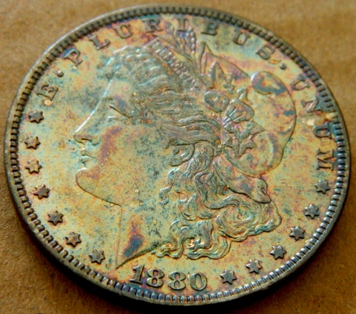 🌈BU.1880-o $1 Morgan Silver Dollar🌈Rainbow naturally toned.