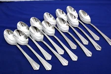 SET, 12 OVAL SOUP SPOONS SYMMETRY-FREEMONT INTERNATIONAL Stainless Flatware