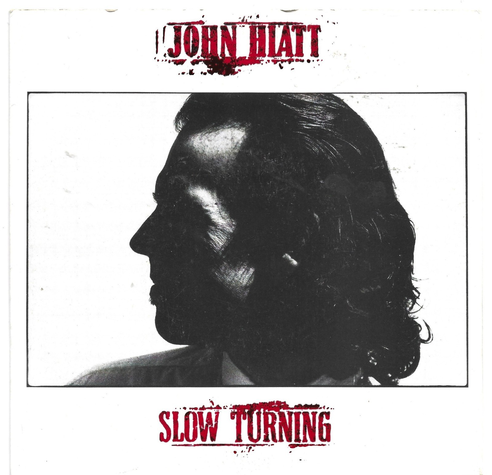 JOHN HIATT - 'SLOW TURNING (1988 7'' 45)'.