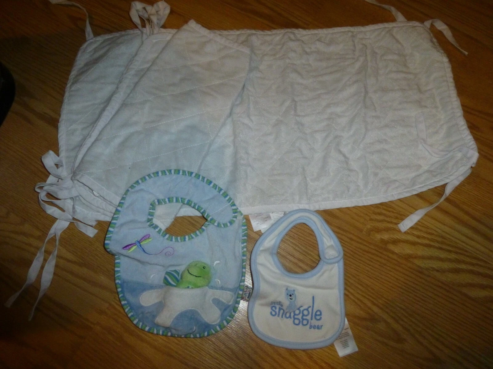 Two Baby Bed Pads and two baby Boy Bibs