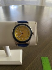 Bijoux Terner quartz watch with a yellow dial...