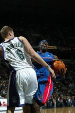 Ben Wallace Detroit Pistons collides with Joel Przybilla Milwauke- 2002 Photo
