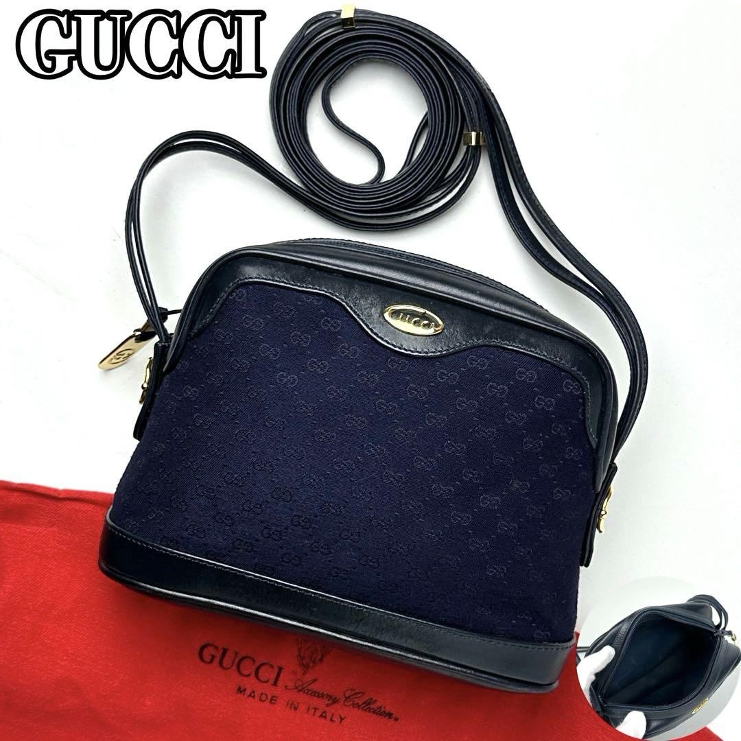 Vintage Gucci GG canvas shoulder bag with gold hardware and leather pouch in excellent condition
