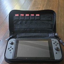  Nintendo Switch Game with 5 games and carrying Storage bag no charger
