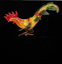 This is a hand-blown glass rooster figurine, Know as a Milano Art Glass rooster