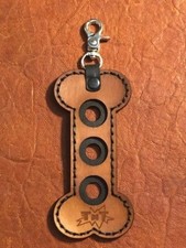 Dog Bone Joint Protector Holder. Nice item. Handy Item For Your Pool Cue Case