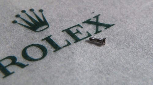 Rolex 3035 55052 dial screw, pre-owned for watch repair