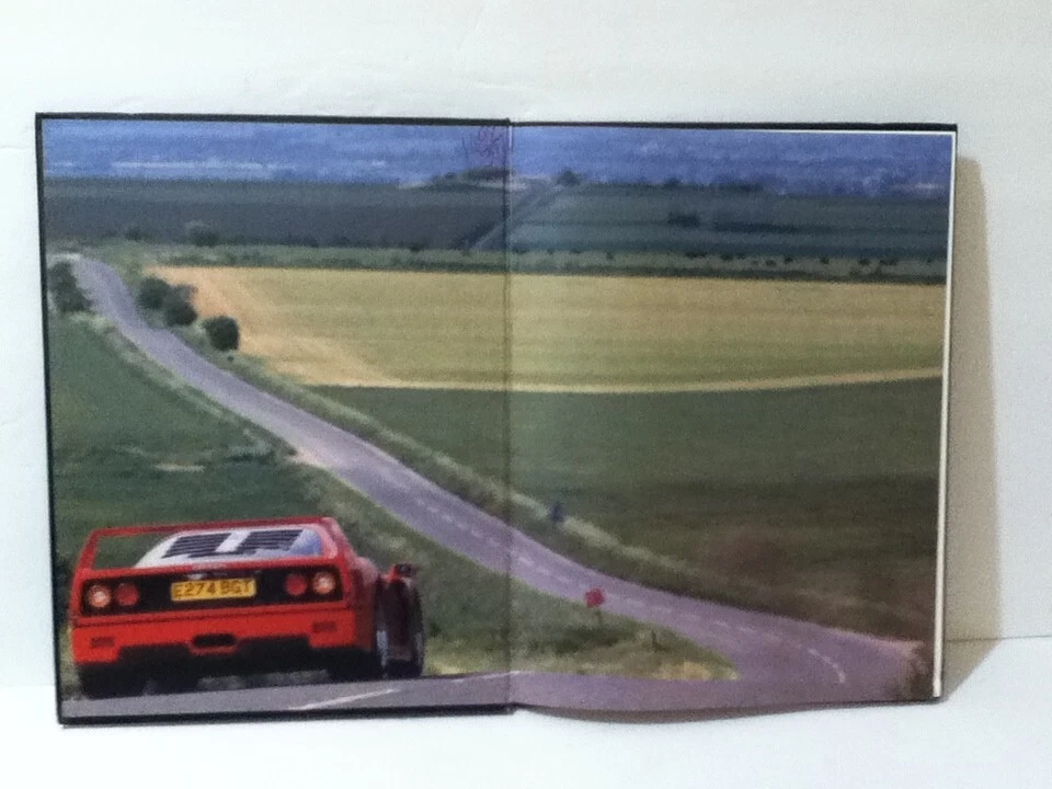 VINTAGE 1990 SUPERCARS FERRARI F40 WRITTEN BY: MARK HUGHES - Image 4 of 4