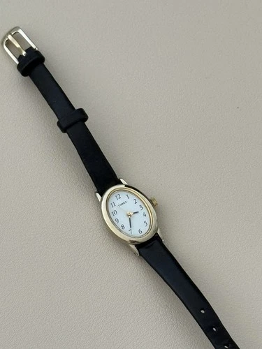 Vintage Timex Cavatina Women's Gold Tone Quartz Watch 18mm White Oval Dial