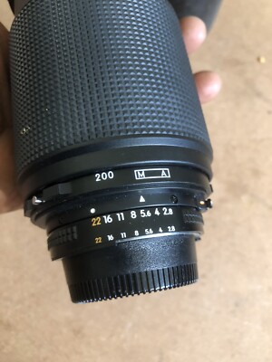 Nikon ED AF Nikkor 80-200mm 1:2.8 w/ Lens Cover, Filter, and CL-43