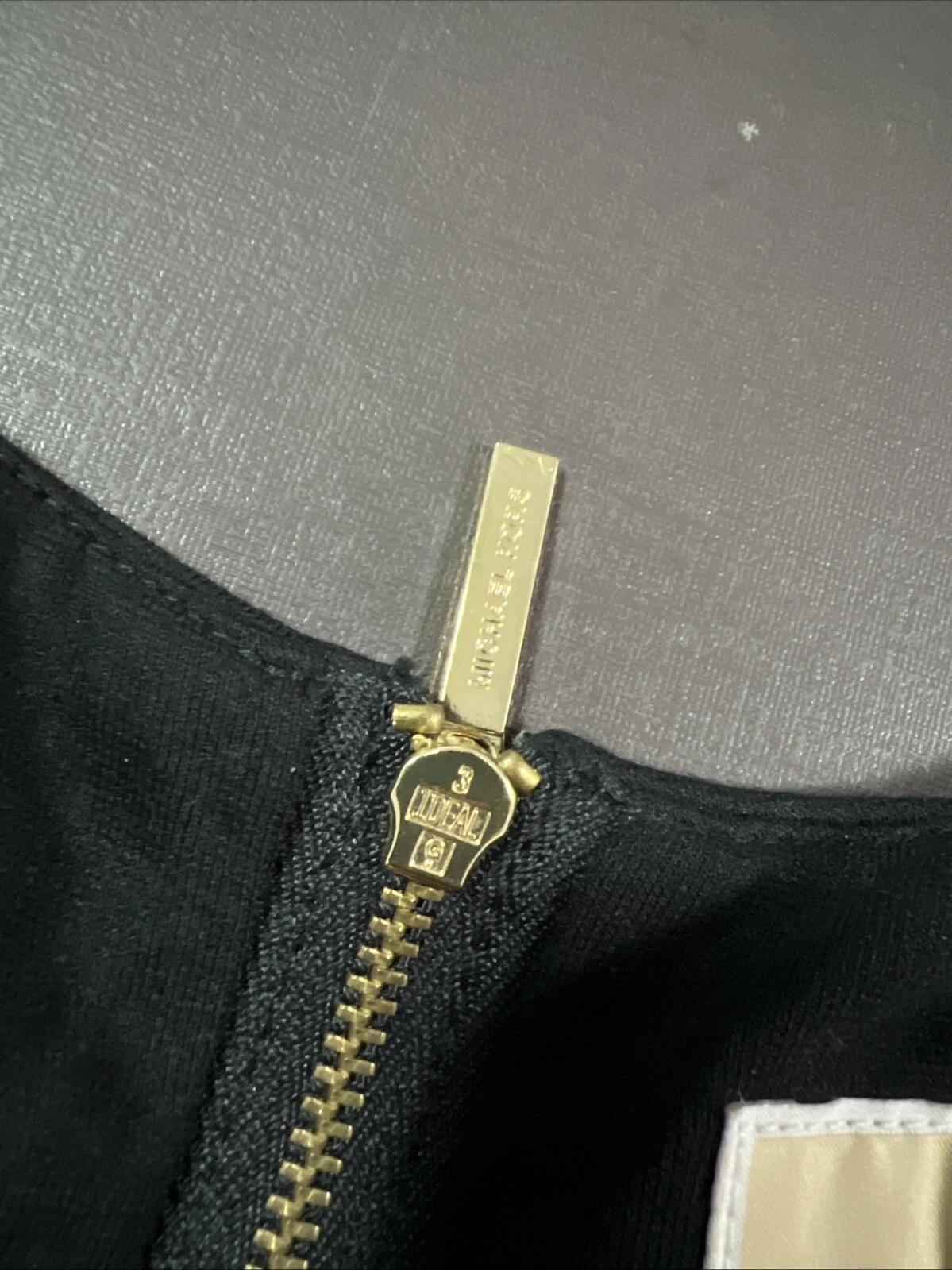 Abito donna Michael Kors piccolo nero pelle di agnello manica lunga zip tasche Italia