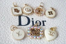 Dior gucci 7 charms  gold / colored  lot of 7 zipper pull mix