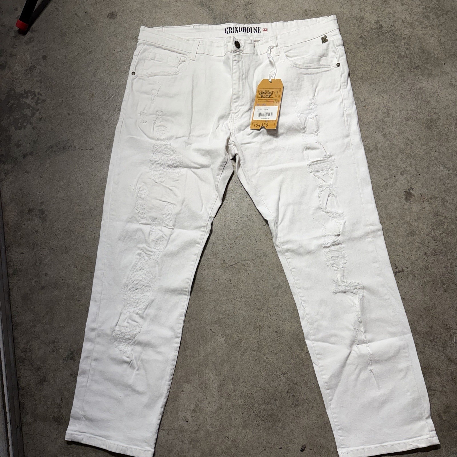 white distressed Grindhouse denim jeans. Size 44