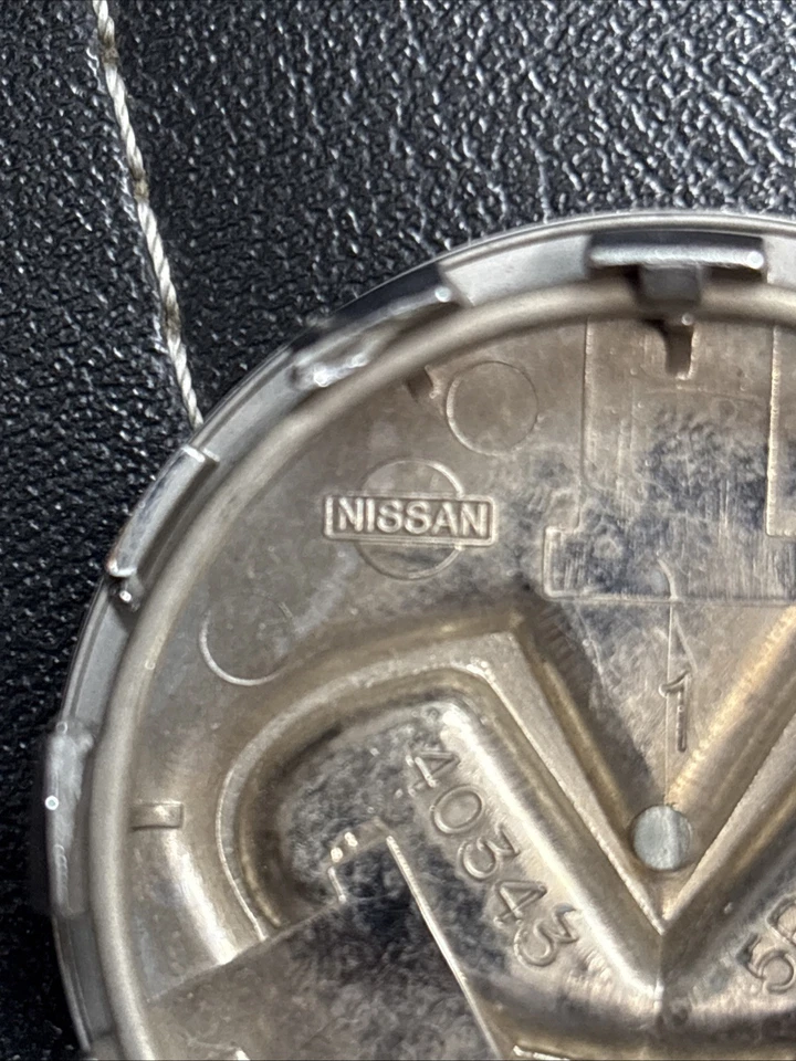 4 tapas centrales de llantas genuinas OEM INFINITI G35 M35 G37 Q60 Foto 3 de 4