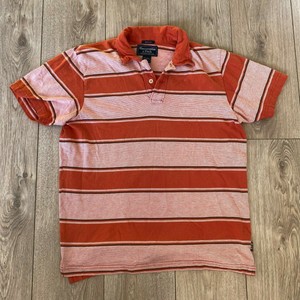 orange striped polo