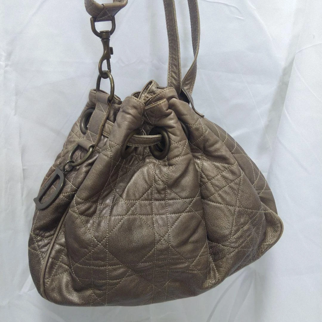 Sac bandoulière Christian Dior Canage cuir agneau doré authentique occasion