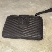 Steve Madden sage wristlet with chevron pattern logo detail and wrist strap