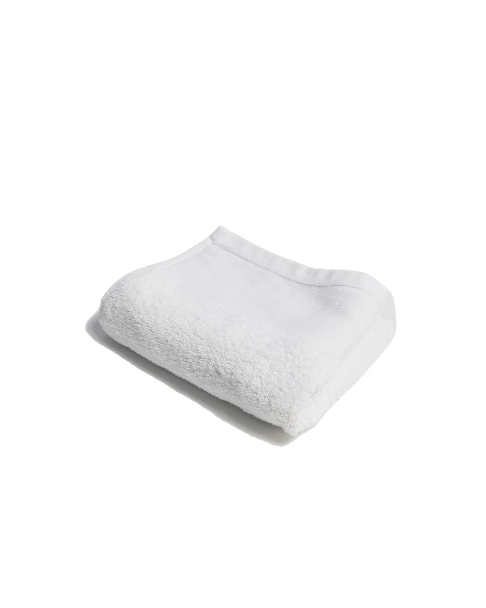 Black skin online white towels