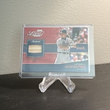 2002 CHIPPER JONES PLAYOFF POG-14 PIECE OF THE GAME USED BAT RELIC SP CARD