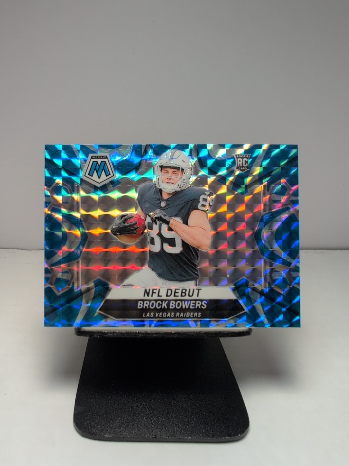 2024 Panini Mosaic - NFL Debut Brock Bowers #286 Reactive Blue Mosaic Prizm (RC)
