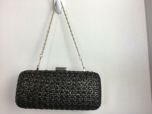 black and gold evening bolsa