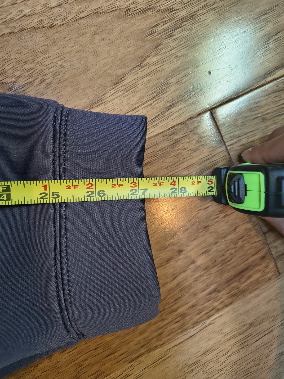 Gray Nike Project FROG hoodie, men's XL, with yellow tape measure showing white stitching and ribbed cuffs.