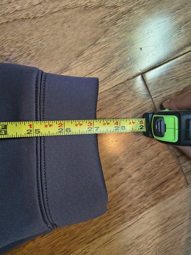 Gray Nike Project FROG hoodie, men's XL, with yellow tape measure showing white stitching and ribbed cuffs.