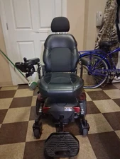 Metris XXL - Motorized medical wheelchair/scooter, red in color