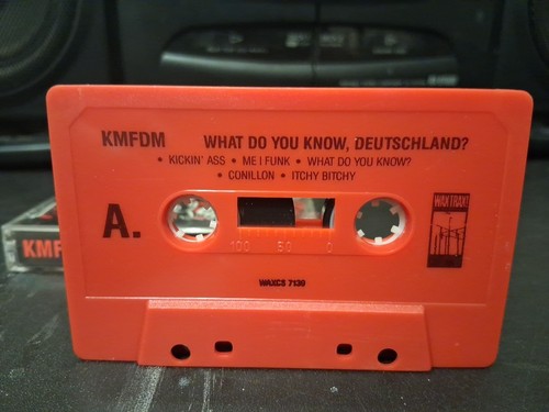 KMFDM What Do You Know Deutschland? Wax Trax 1991 Cassette Red Tested Metal - Picture 4 of 5