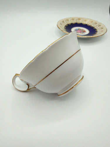 Taza de té y platillo Aynsley azul cobalto rosa interior floral dorado JA Bailey - Imagen 11 de 13