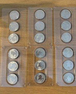Harry Potter Collectible Coin Set Metal Tokens in Plastic Cases