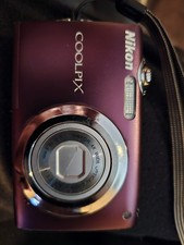 Nikon Coolpix S3000 12MP Digital Camera w/4x Wide Zoom Plum Bundle