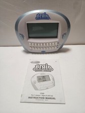 Radica-Brain Games-Handheld Electronic Game With Manual -Used, Tested, 2006