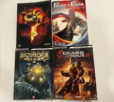Lot of 4 Strategy Guides - BioShock, Dragon Age, Gears of War, Darkness II
