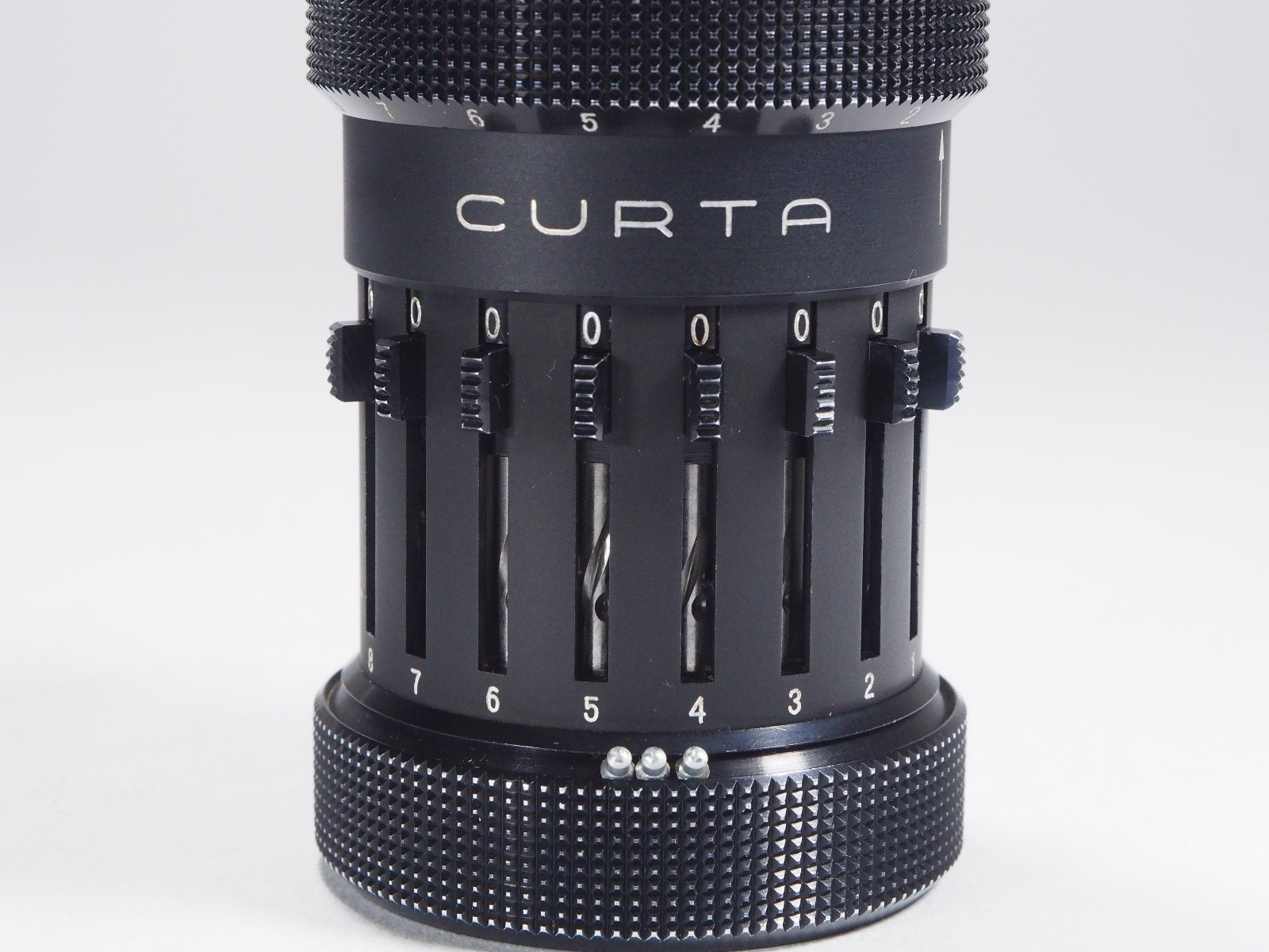 Curta Calculator 1954 Type 1 all metal w/can, box, 3 manuals, perfect function