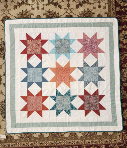 Handmade quilt, 48" x 48", blue, peach and off white, star design